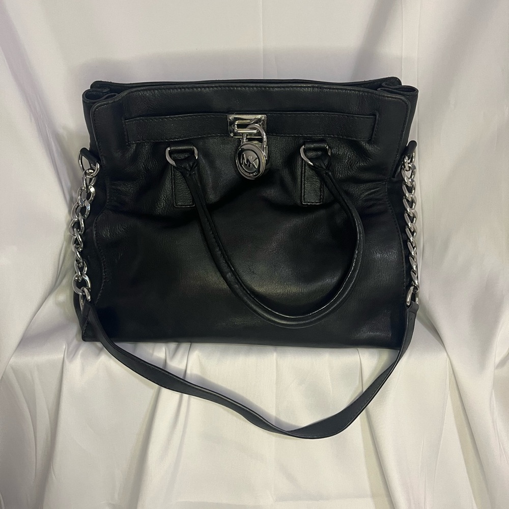 Black Michael Kors bag with silver hardware